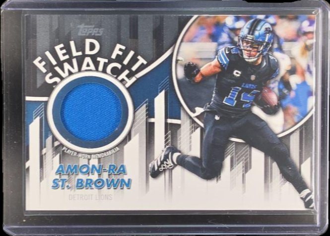 Amon-Ra St. Brown 2026 Topps Field Fit Swatch Collection /99