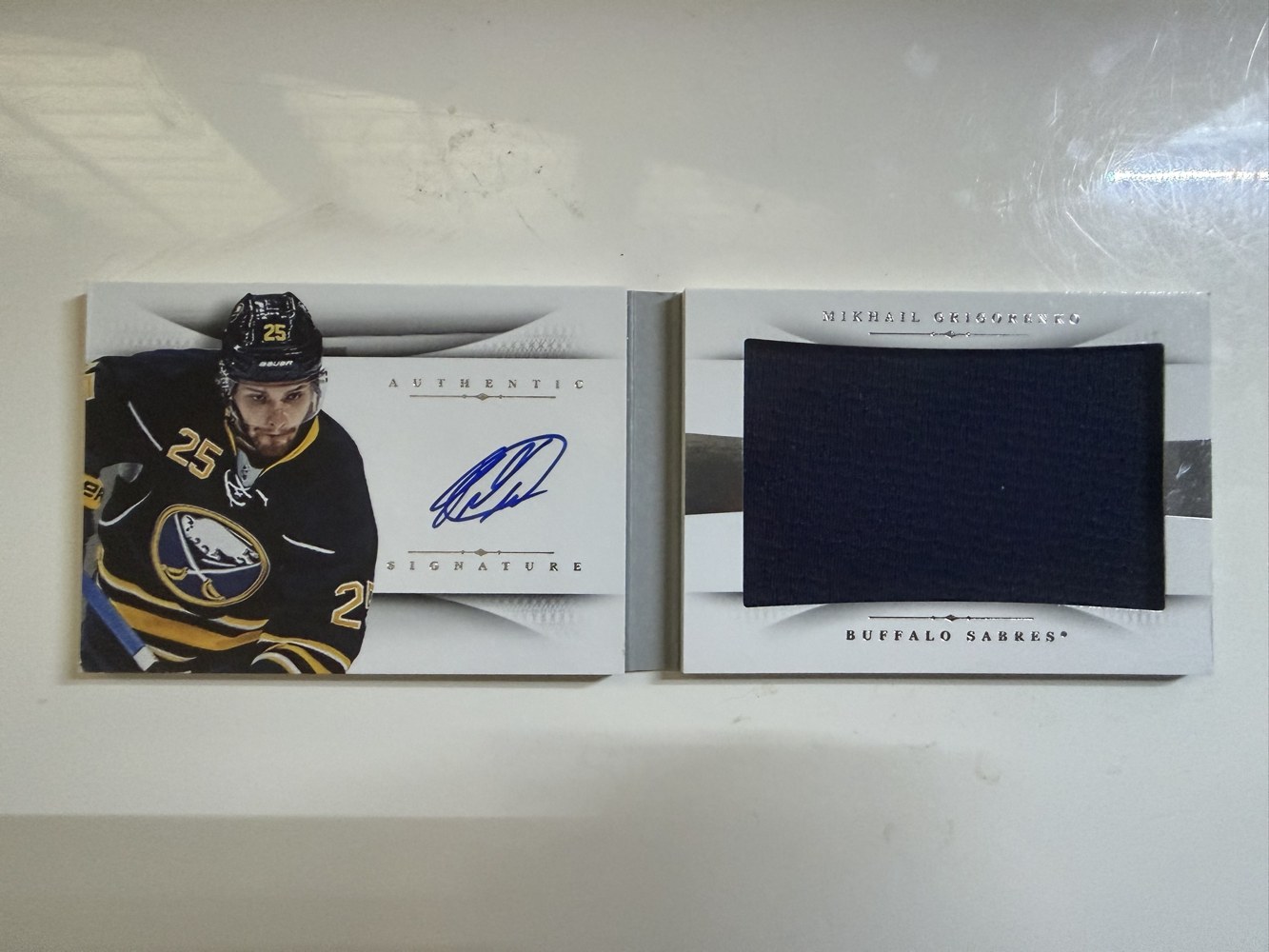 Mikhail Grigorenko 2013 Panini National Treasures Rookie Booklet Dual Class Autograph Jersey /99