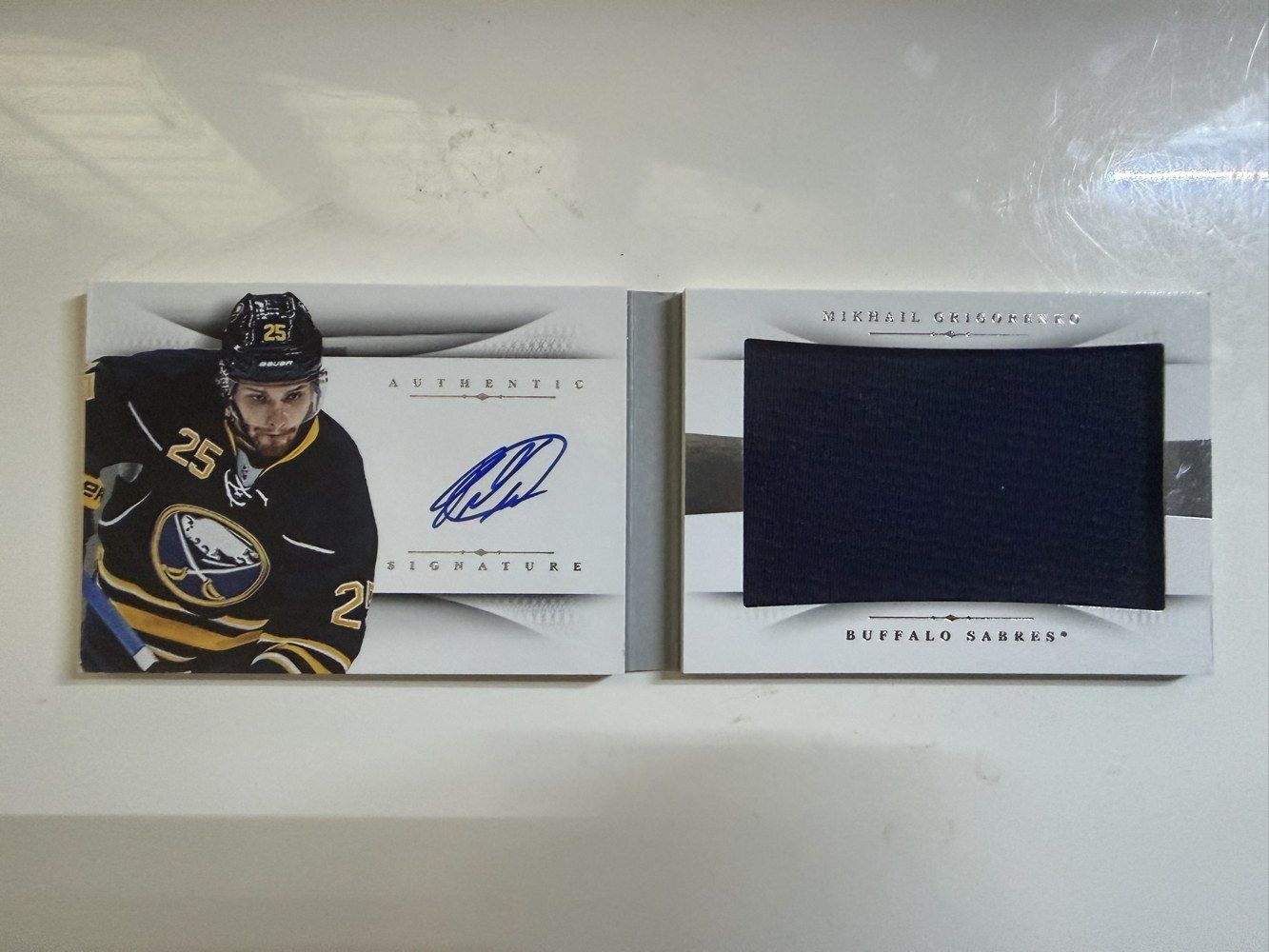Mikhail Grigorenko 2013 Panini National Treasures Rookie Booklet Dual Class Autograph Jersey /99